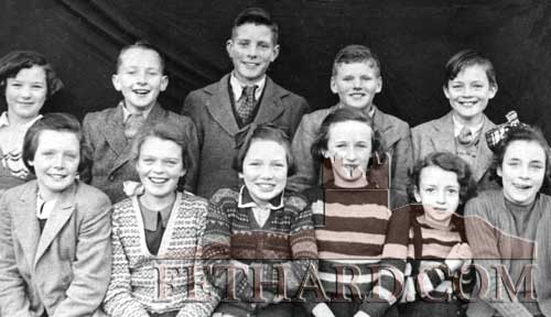 Coolmoyne National School Confirmation Class in 1953. Back L to R: Annie Coady, Christy Walsh, Michael Croke (Redcity), Bernie Flanagan, David Oâ€™Meara. Front L to R: Ita O Dwyer, Gretta Egan, Catherine Bergin, Eileen Morrissey, Noelle Maher and Marie Oâ€™Meara.