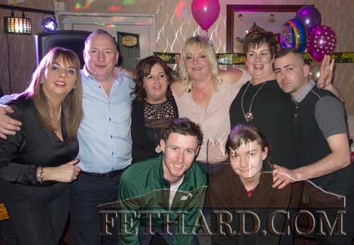 Martha Blackett (back left-centre) photographed with members of Lonergan's Bar staff at a special surprise farewell party held on Saturday night last. Martha is leaving Lonergan's this week to take up her new employment position in Clonmel. All the staff and customers gave Martha a huge send off and their best wishes in her future position.