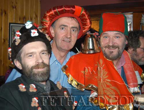 L to R: Johnny Oâ€™Connor, Phil Shee and John Shortall at the Christmas Hat Party for CRC Santa Bear Appeal held in the Bridge Bar, Fethard.