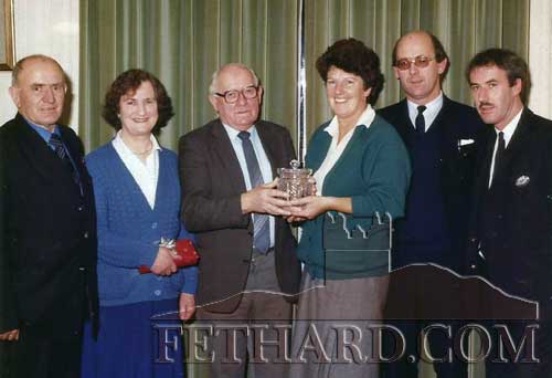 Photograph taken in November 1987 of John's father, Joey Fogarty's retirement as postman after 20 years delivering on the same route as John. To mark the occasion postmistress, Ann Connolly, made a presentation on behalf of the staff. Left to right: Joe Danaher, Laoise Fogarty (Joey's wife), Joey Fogarty, Anne Connolly, John Fogarty and Davy Lawless.
