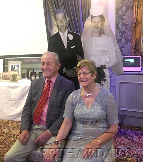 Sean and Breda Spillane, Tullamaine, who recently celebrated their 50th Wedding Anniversary with their family and many friends. In the background a life-size photograph of their wedding day 50 years ago.