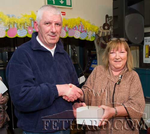 Ann Butler presenting the 'Mentor of the Month' award to Chris Coen