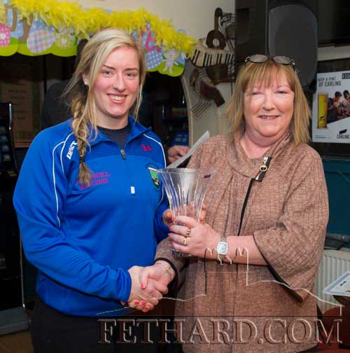 The joint-winner of the Butler's Bar Fethard Sports Achievement Award for February, Edel McMahon, receiving her award from Ann Butler (right). The other joint-winner was Eoin Tynan but unable to attend.