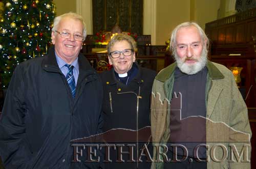 Photographed at the Christmas Carol Service at Holy Trinity Church of Ireland, Fethard are L to R: John Fryday, Rev. Canon Barbara Fryday and Ken Homfray.