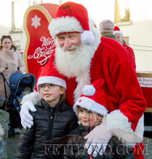 Santa photographed with Lauren Connolly and Cian Connolly, last year after arriving at The Square Fethard. This year Santa will be back on Friday, December 7, at 2.30pm to turn on the Christmas Lights. 