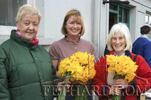 Buying daffodils on 'Daffodil Day' in Fethard on March 11, 2005 are L to R: Philly Kenny, Anne Fleming and Veronica Wilkinson.