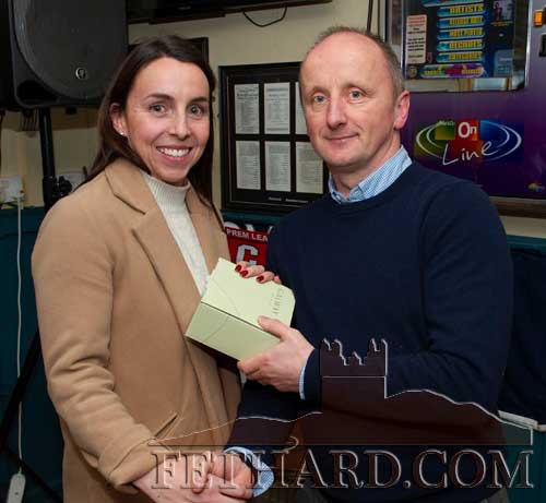 

Ken Moloney, representing this month’s sponsor, Heineken, presenting the 'Mentor of the Month' award to Ms Helena Walsh, P.E. Teacher at Patrician Presentation Secondary School, at the Butlers Bar Fethard Sports Achievement Awards for December on Friday, January 10.