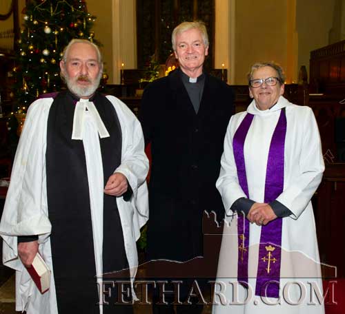 Photographed at the Christmas Festival of Nine Lessons and Carols at Holy Trinity Church of Ireland Fethard are L to R: Ken Homfray, Fr. Iggy O'Donovan OSA and Rev. Canon Barbara Fryday.