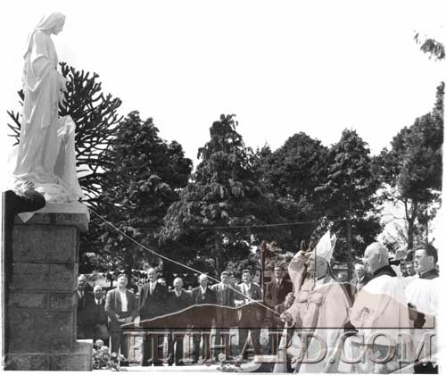 This photo taken on August 15, 1954, at the blessing of the Mary Immaculate Shrine by Archbishop O'Donnell in Killusty on the site of the old school. L to R: Lar Donovan (Byrneskill), Dick Donovan (Walshbog), Michael Byrne (Killusty), Pat Cantwell (Loughcopple), Pat Lonergan (Shanbally Lisronagh), Jim Corr (Killusty South), Tom Sheehan (Clarebeg), Tommy O'Connell (Main Street Fethard), Dick Allen (Killusty), Master Neddy Holohan (Killusty), Archbishop O'Donnell, Paddy O'Meara, Cloran (partially hidden), Phil Quinn (Walshbog), Master Larry Hickey (Cloran), Canon Ryan P.P. (Fethard), Mick Halpin (Killusty), and Fr Lambe c.c. (Fethard).