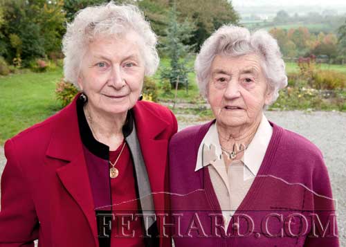 Sr. Monica Kevin, formerly from Barrack Street, Fethard, is photographed above with her school friend, the late Tessie O’Brien, on Wednesday, October 13, 2010, on the occasion of their first meeting since their school days at the Presentation Convent Fethard from 1932 to 1935.  At the young age of 15, Monica Kevin left Fethard on August 8, 1935, to join the Ursuline Sisters of Tildonk in New York City – one of four young local girls, the others being Nuala O’Brien, Kitty McCarthy and Nellie Carey. Sr. Monica, a three-time Fordham graduate, former biology professor and dean at the University, died at the age of 99, on March 24, 2019, in Brentwood, New York. 