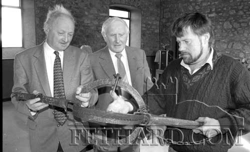 Pictured at the Famine Mass in Drangan on September 24, 1995 are L to R: Michael Hall (Kyle), Arthur Wilson (Rathkenny) and Liam Meagher (Lismoynan) looking at a man trap, which was used to protect food stores from theft during the Great Irish Famine.