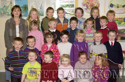 Junior Infants Class at Nano Nagle Primary School Fethard. Back L to R: Ms. Margaret Gleeson (teacher), Rachel O'Meara (Woodvale Walk), Gary Bradshaw (The Green), Shane Moloney (Kerry Street), Emma Hayes (Burke Street), Emma Walsh (Ballintemple), Joseph O'Hagan, (The Square). Third Row L to R: Shannon Dorney (Slievenamon Close), Donal Walsh (The Green) Colin Grant (The Valley), Emma Morrissey (Barrack Street), Brian Healy (The Green). Second Row L to R: Kevin Allen (Slievenamon Close), Darrell Needham (Slievenamon Close), Tara Horan (Tullamaine), Vincent Lawrence (Woodvale Walk), Jade Pattison (Spittlefield), Gerard Gorey (Jesuit’s Walk), Áine Phelan (Coolmore). Front Row L to R: Jack Connolly (The Green), Adam Hall (St. Patrick's Place), Jessie McGrath (Rathcoole), Anastasia Blake (Kilnockin Road) and Aobh O'Shea (The Valley). (November 15, 2000)