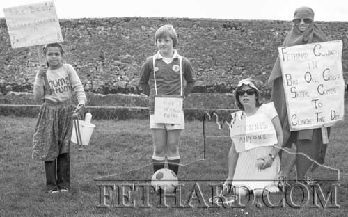 Fethard Fancy Dress Parade on June 29, 1980. Entries L to R: 'The Bes Window Cleaner in Town!'; 'The Real Thing'; 'Tennis Anyone?' and 'Fethard Council in Big Oil Coup – Sheikh Comes to Clinch the Deal!'.