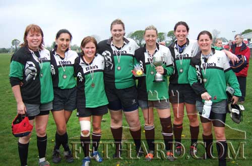 Photographed above are the seven Fethard members of Clonmel Ladies All-Ireland winning rugby team who won the All Ireland final in Portlaoise on Sunday. The occasion was extra special for Jenny Fogarty as she was also celebrating her birthday on the day and was presented with a cake. L to R: Catherine Kenny, Charlene Roche, Aisling Kenny, Mary Gorey, Jenny Fogarty, proudly holding All Ireland Cup and her birthday cake, Amy Hopkins O’Connor, and Valerie Colville Connolly.