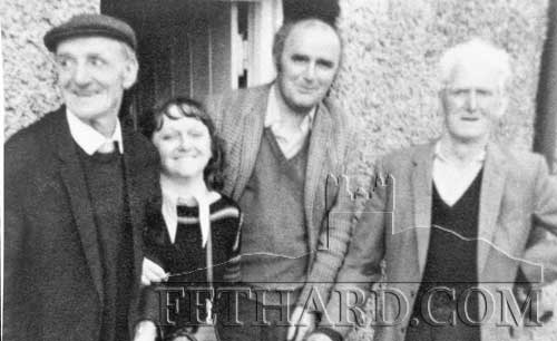 Standing at doorway in Killenaule are Robbie O’Connor, Pat O’Connor and Willie O’Connor. The girl is probably Robbie’s daughter. 