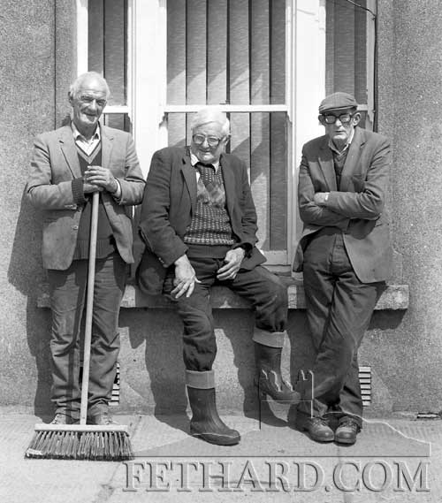 Taking a well-earned rest during a hot spell of weather on Main Street, Fethard, in May 1989 L to R: Tommy Kearney, Mikey Treacy and Mick Gleeson.
