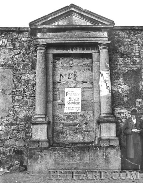 The front door of the demolished Military Barracks on The Square, photographed in 1964. ‘The Seat’, as it was often called, was relocated in 1974 to Rocklow Road as the entrance to the new Sports Centre, officially opened on Sunday, June 9, 1974.