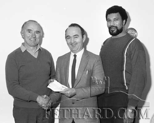 Michael Cummins (center), presenting sponsorship on behalf of O'Briens Minerals, to Tony Newport and Joe Ryan for the Munster Open Racquetball Championships held in Fethard in 1986.