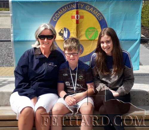 Joe Purcell winner of the Community Games Boys U12 Handwriting Event, pictured above with his Mum Louise and sister Taren.
