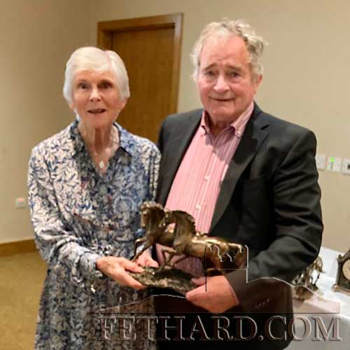 Fethard Bridge Club President, Margaret Slattery, presenting the President’s Prize to David O’Meara, who accepted the prize also on behalf of his winning partner Francis Lacey