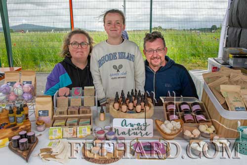 'Away with Nature' stall, a family run business run by Fiona O'Donohoe and based in Drangan, photographed with her daughter Aoife and partner Shane.