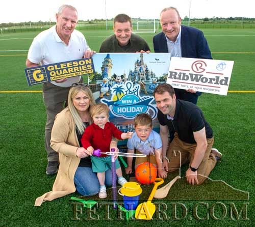 L to R: Maurice Moloney, Fethard Town Park; Tommy Sheehan, Fethard Town Park; Anthony Fitzgerald, Head of Enterprise, Tipperary County Council.  Front L to R: Nicola Caulfield, Waterford, winner of the 'Holiday of a Lifetime', with her children Freddie, Mikey and husband Michael Power.”