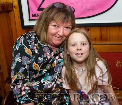 Anne Butler, proprietor of Butlers Sports Bar, photographed with her grand-daughter Laura Butler.