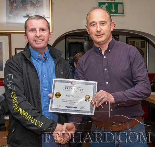 Eoin Sturgeon Tynan accepting his Sports Achievement Award Nomination Certificate for July, from this month's sponsor, Des O'Meara, Physiotherapy & Sports Injury Clinic, Tullamaine, Fethard. Eoin represented Ireland in Racquetball at the World Games which were held in Birmingham Alabama USA.