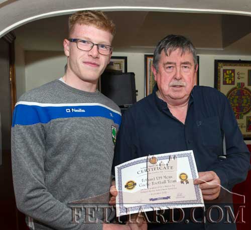 Darragh Spillane accepting the nomination certificate from Philip Butler on behalf of Fethard U19 Mens Football Team who were winners of the South Tipperary U19 B with a fine win against local rivals Moyle Rovers.