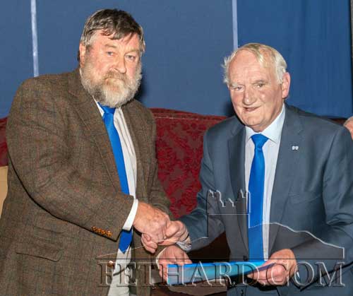 Noel Byrne making a presenting to Jimmy O’Shea in October 2018 achnowledging his life service to Fethard GAA Club and to Fethard Community.