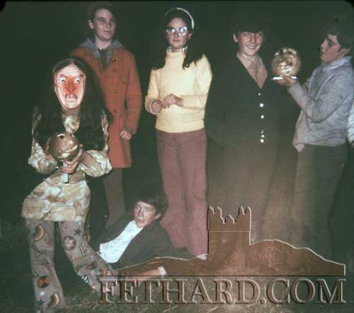 Halloween celebrations on The Green. L to R: Valerie McCormack, Marie Trehy, Paula Carey, ? Morrissey, Paddy Trehy. In front laying on the ground is Tommy McCormack