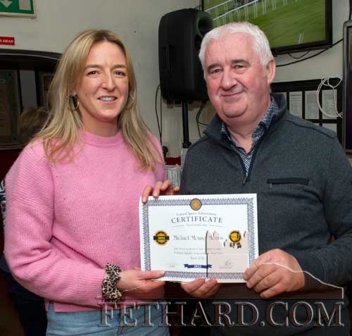 Olivia Fitzroy accepting a nomination certificate on behalf of Michael 'Mouse' Morris, for the March award who had a good double at Thurles racetrack with ‘French Dynamite’ and ‘Gentlemansgame’ doing the business.