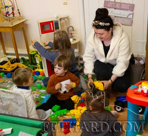 Maryna Gavrylenko photographed with her son Michael and his cousins, nine-year-old Alina and four-year-old Damir in the converted playroom at Fethard's Presentation Convent.
