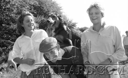 Roseanna Ponsonby and Sara Cleary who were judges at Moyglass Gymkhana Dog Show in August 1987. Pictured with Willie O’Donnell and his active dog 'Slope', after winning the working Dog Section at the dog Show.