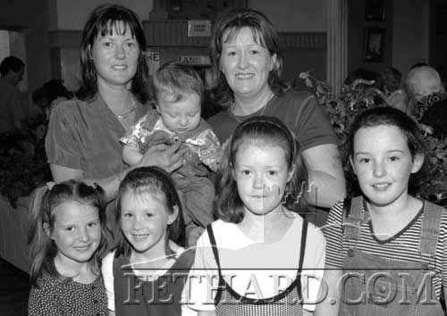 Members of the Moloney and Cannon families photographed at Fethard Flower Show held at Fethard Ballroom in 1998