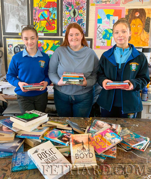 Patrician Presentation Secondary School students Margaret Keane and Matilda Molloy (left), sorting books with teacher Miss Rebecca Fogarty (centre), in preparation for the Tipperariana Book Fair which will be held in Fethard Ballroom on Sunday, February 12, from 12 noon to 4.30pm. The students will take a stall at the Book Fair, organised by Fethard Historical Society, with proceeds going towards the purchase of books for the English department at the school.