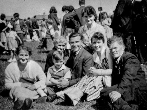 Having a rest at Fethard Carnival are Kate Myles, Mrs Joe Fitzgerald, Bill Meaney, Bernie Myles, Billy Murphy, the child in front is Stephen Cummins.