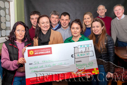 Ballyluskey White Heather Harriers presenting the proceeds of their New Year Meet, which amounted to a total of €6,840, to the Community Air Ambulance Service,  in memory of Bobby Guiry, Peppardstown, who passed away in November 2022. Bobby was a long time supporter of the White Heather Harriers and always enjoyed hosting his annual Christmas lawn meet at Peppardstown. Back L to R: Cathal Slattery, David Guiry, Cillian Slattery, Nicola Guiry, Philly O'Connor, Jack Ronan. Front L to R: Fiona Slattery, Lorraine Toner [Air Ambulance] Anna Cooke, and Mary Jane Kearney.