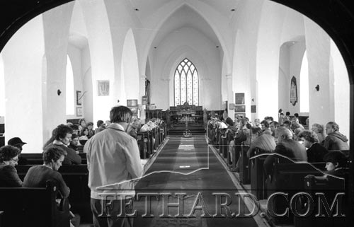 John Bradley, director of Urban survey giving a walkabout tour of Fethard on June 28, 1987. Photographed above speaking at Holy Trinity Church of Ireland.